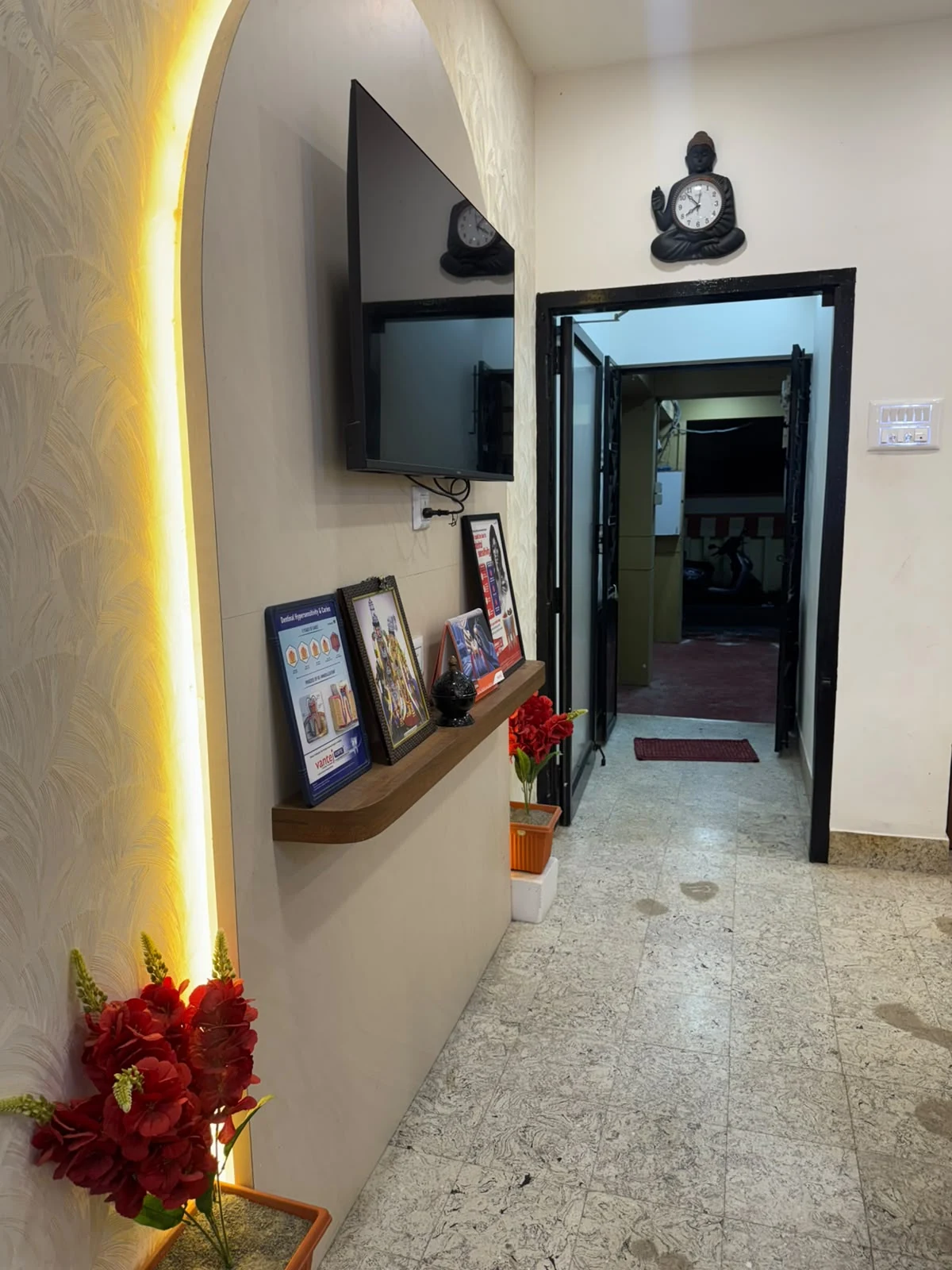PVM Dental Hospital Patient Corridor with TV and Dental Health Charts